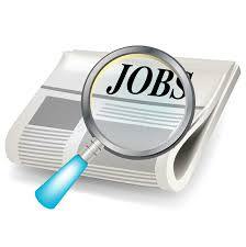 Newspaper with Job search and magnifying glass