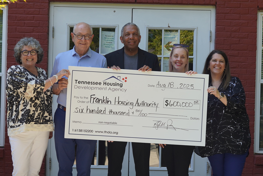FHA Key Staff accepted award of $600,00 from THDA representatives